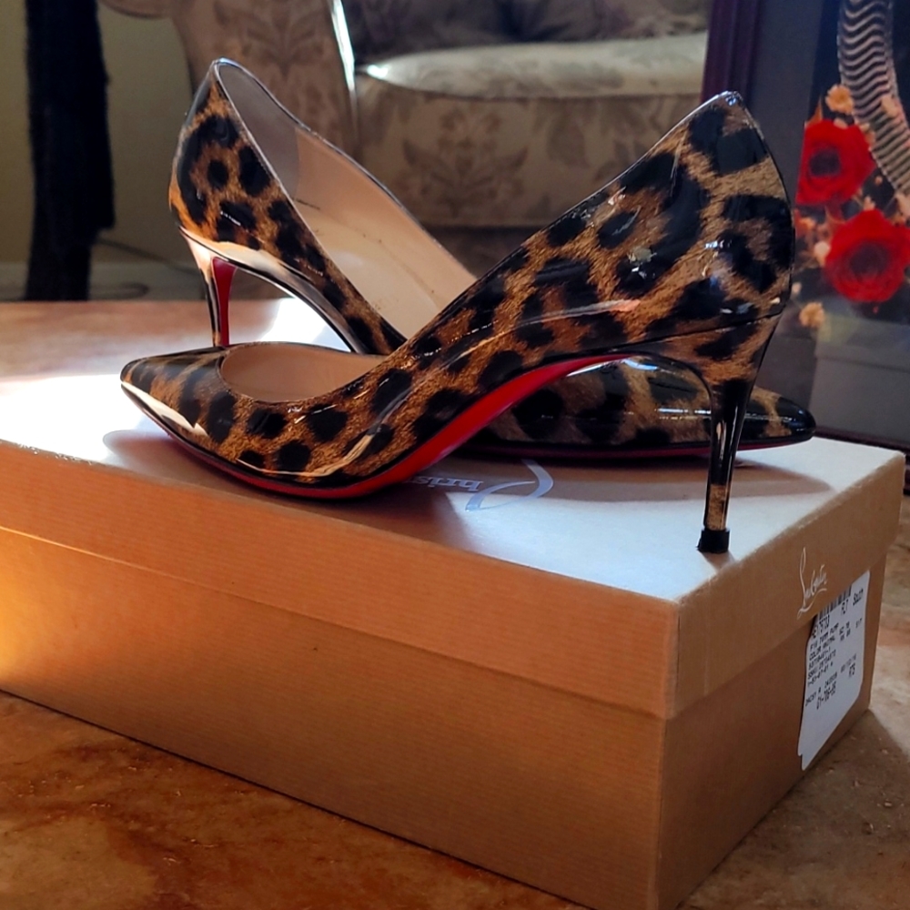 Louboutin Leapord in great condition nice comfortable heal length!